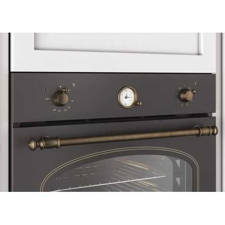 Pannello comandi analogici e manopole ottone del forno Candy FCC604GH/E